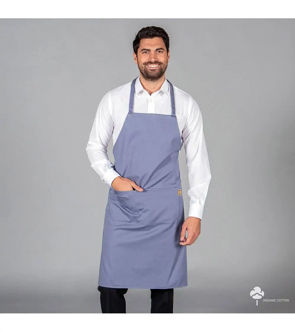 Profesional en cocina. hombre con delantal de hipster de cocinero