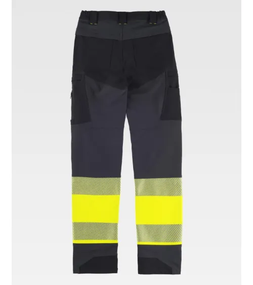 PANTALON TREKKING ALTA VISIBILIDAD GRIS AMARILLO EJEMPLO DE USO