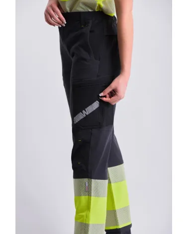 PANTALON TREKKING ALTA VISIBILIDAD GRIS AMARILLO DETALLE COSTADO